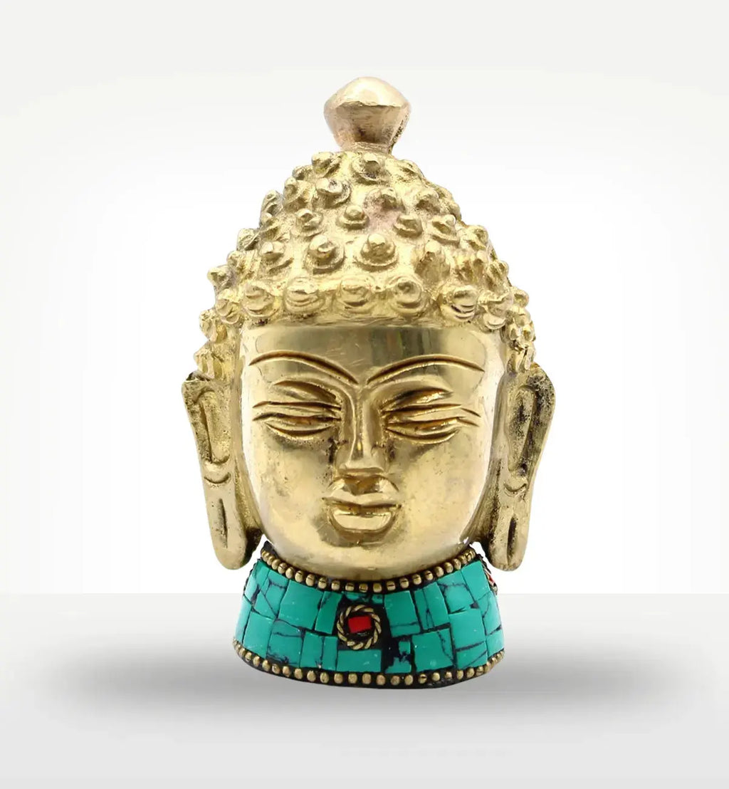 Brass Buddha Figure - Med Head - 8 cm with detailed facial features and textured hair, sitting on a decorative turquoise base, perfect for serene Buddha decor and meditation spaces.