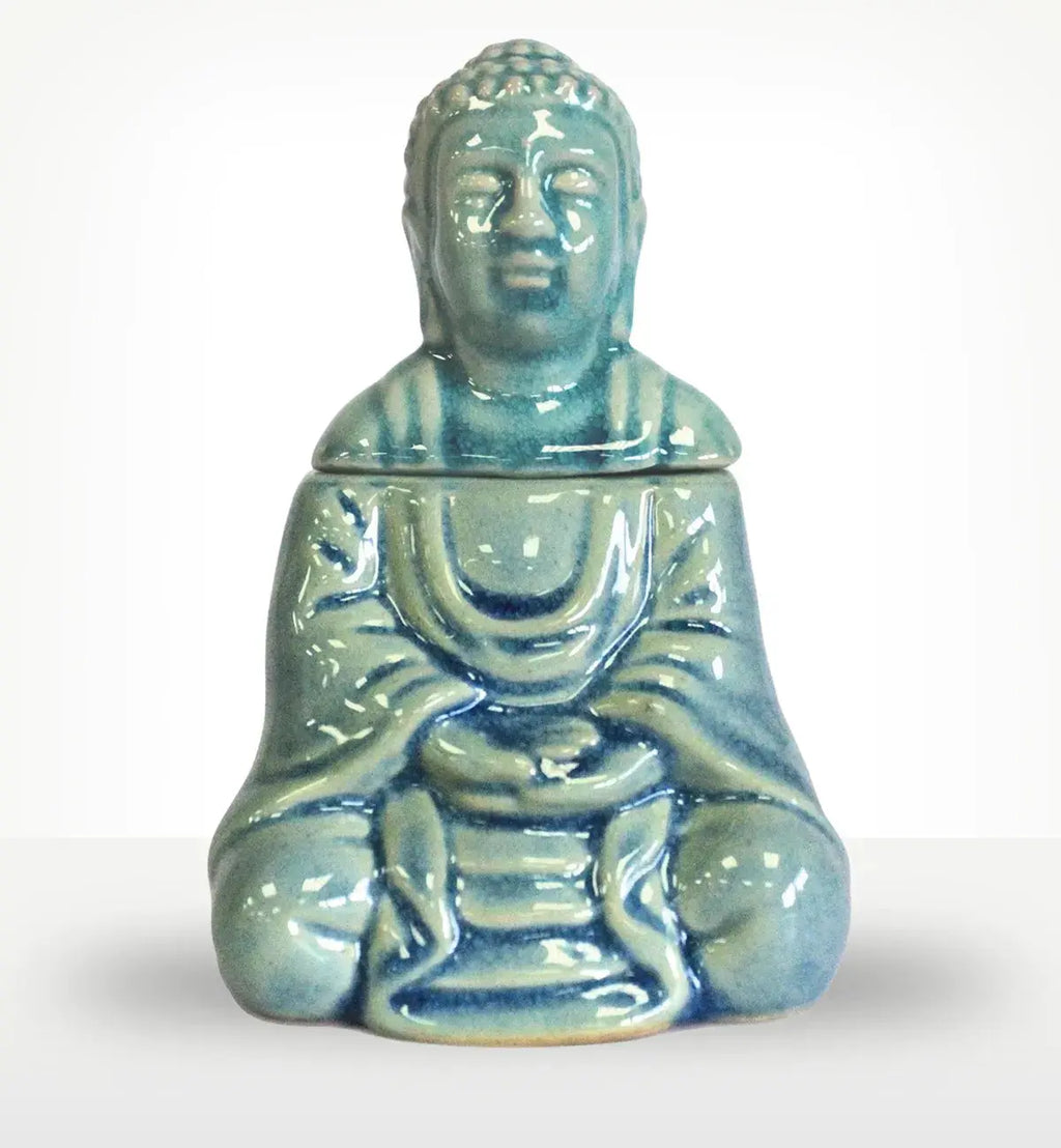 Glossy blue Sitting Buddha Oil Burner - Blue made of ceramic with detailed serene Buddha figure holding a bowl, perfect for Buddha decor and calming ambiance.