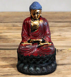 Antique Buddha - Classic Statue featuring a red and gold hand-painted resin Buddha seated in meditation on a detailed black lotus base, ideal for serene Buddha decor.