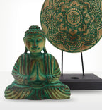 Buddha Feng Shui Set - Buddha Knot - Green featuring a hand-carved Buddha statue with a serene expression and decorative green accents, accompanied by a round mandala plaque on a black stand.