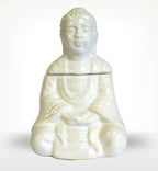 Sitting Buddha Oil Burner - White ceramic Buddha statue designed for holding and diffusing oil, featuring a serene seated pose and smooth glossy finish.