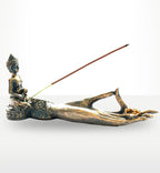 Antique Buddha - Hand Incense Burner featuring a reclining Buddha figure with intricate detailing, designed to hold and burn incense sticks elegantly.