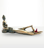 Antique Buddha - Hand Incense Burner in a brass finish featuring a seated Buddha figure on an extended hand holding a cone incense, combining artistic decor with spiritual ambiance.