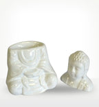 Sitting Buddha Oil Burner - White, ceramic Buddha statue split into head and body parts, glossy finish, designed as a decorative and functional oil burner for calming ambiance.