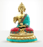 Brass Buddha Figure - Blessing - 15cm with turquoise and red inlay, seated in meditation pose, symbolizing peace and spiritual blessing in detailed brass craftsmanship.