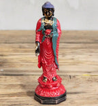 Antique Buddha - Standing statue featuring hand-painted details in red, green, and gold tones, designed as a decorative resin Buddha figure with intricate robes.
