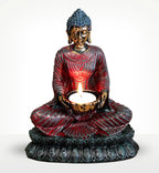 Antique Buddha - Devotee Candle Holder featuring a hand-painted Buddha statue in meditative pose holding a lit candle, blending peaceful decor with warm illumination.