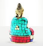 Brass Buddha Figure - Hands Up - 7.5 cm featuring a detailed textured brass head and a vibrant mosaic-style robe in turquoise, red, and blue colors.