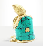 Brass Buddha Figure - Thinking - 6.5 cm shows a small brass statue with intricate detailing and a turquoise mosaic robe, embodying peaceful and reflective Buddha decor.