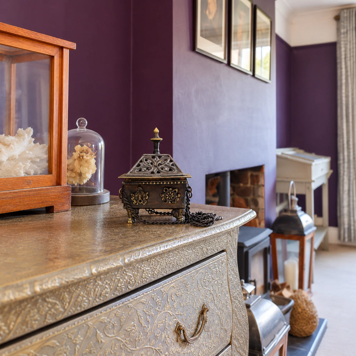 Brass Tibetan Incense Burner, Eight Symbols Square Hanging Pot on a chest in a British sitting room.