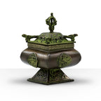 Brass Verdigris Tibetan Burner - Four Symbols Square Standing Pot with intricate green patina detailing and ornate carved designs on a square pedestal base.
