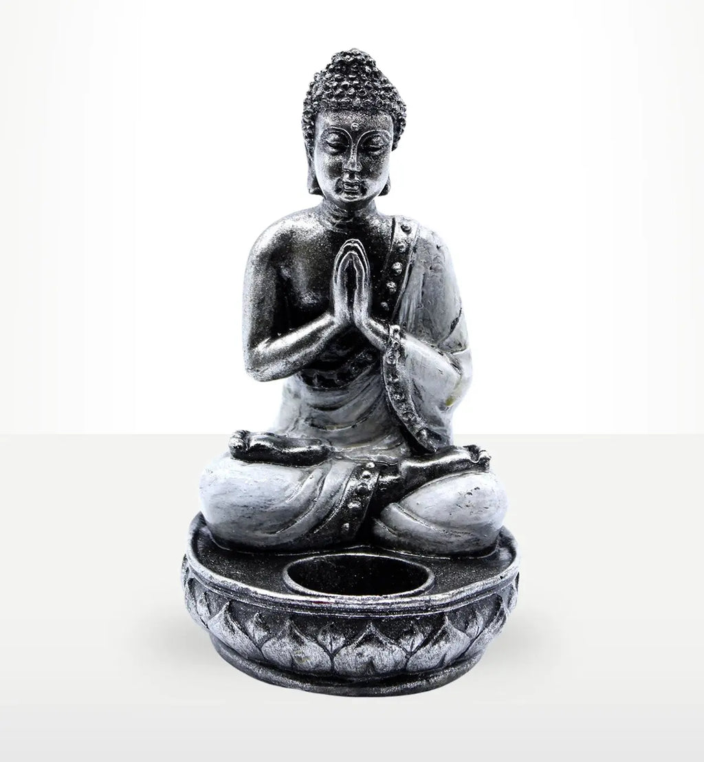 Buddha Candle Holder - White - Medium featuring a serene Buddha figure in a seated meditation pose, designed as a decorative resin candle holder with intricate lotus patterns.