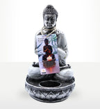 Buddha Candle Holder - White - Medium featuring a serene Buddha figure seated in meditation with a circular base designed to hold a candle, combining spiritual decor with peaceful ambiance.