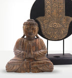 Buddha Feng Shui Set - Hamsa - Grey featuring a hand-carved resin Buddha statue in a meditative pose paired with a decorative grey Hamsa wall hanging with intricate designs.