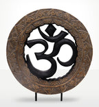 Buddha Feng Shui Set - Om - Grey & Black features a hand-carved grey and black Om symbol within an intricately detailed circular frame, perfect Buddha decor for mindful spaces.