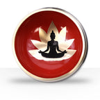 Buddha Singing Bowl Set- Black/Orange 10.7cm featuring a black Buddha silhouette seated in meditation on an orange background with a gold lotus flower design.
