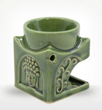Square Buddha Burner - Dark Jade ceramic oil burner featuring a carved Buddha face and decorative swirling patterns for calming Buddha decor and incense use.