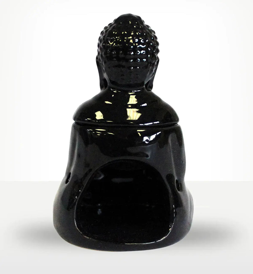 Sitting Buddha Oil Burner - Black made of glossy resin with a smooth finish, featuring a hollow base designed for holding oil or wax melts in a calm, decorative style.