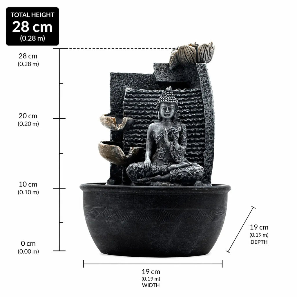 Tabletop Water Feature - 19x19x28cm - Buddha, Lotus Flower Cascading Potsx with a hand-carved Buddha statue seated beside cascading lotus flower pots in a textured black basin.