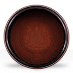 Earth Powder Singing Bowl - Clay Om Buddha - 16cm featuring a detailed clay-colored Buddha figure seated in meditation, surrounded by intricate artistic patterns inside the bowl.