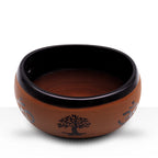 Earth Powder Singing Bowl - Clay Om Buddha - 16cm with earthy clay exterior featuring Om symbols and a tree design, contrasted by a smooth black interior, perfect for meditation and decor.