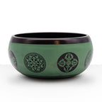 Earth Powder Singing Bowl - Mandala Buddha - 16cm featuring a green exterior with black intricate mandala and Buddha-inspired designs around the bowl's surface.