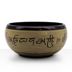 Earth Powder Singing Bowl - Mantra Five Buddha - 16cm featuring detailed script engraving on a brass finish, designed for meditation and spiritual décor by Root & Still.