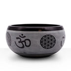 Earth Powder Singing Bowl - Om Five Buddha - 16cm featuring black and gray design with Om symbols and sacred geometric patterns, ideal for meditation and spiritual decor.