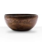 Extra Large Indian Moon Phase Singing Bowl - (approx 1500g) - 22cm with engraved Tibetan script on polished bronze surface, designed for meditation and sound healing.
