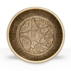 Five Buddha Singing Bowl featuring intricate engraved brass figures of five Buddhas in a circular pattern with detailed traditional motifs on the inner surface.