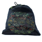 Black drawstring bag with colorful dragon design on a white background