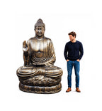 Large Antique Gold Buddha Teaching on Lotus - 2m statue shown next to a man for size comparison, highlighting the detailed hand-carved Buddha statue with antique gold finish.