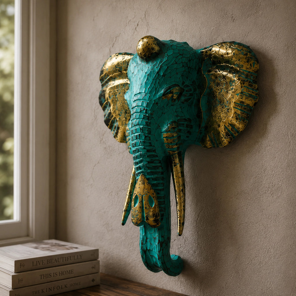 Large Elephant Head - Gold & Turquoise wall sculpture featuring a striking turquoise finish with antique gold accents, perfect for adding artistic charm to home decor.