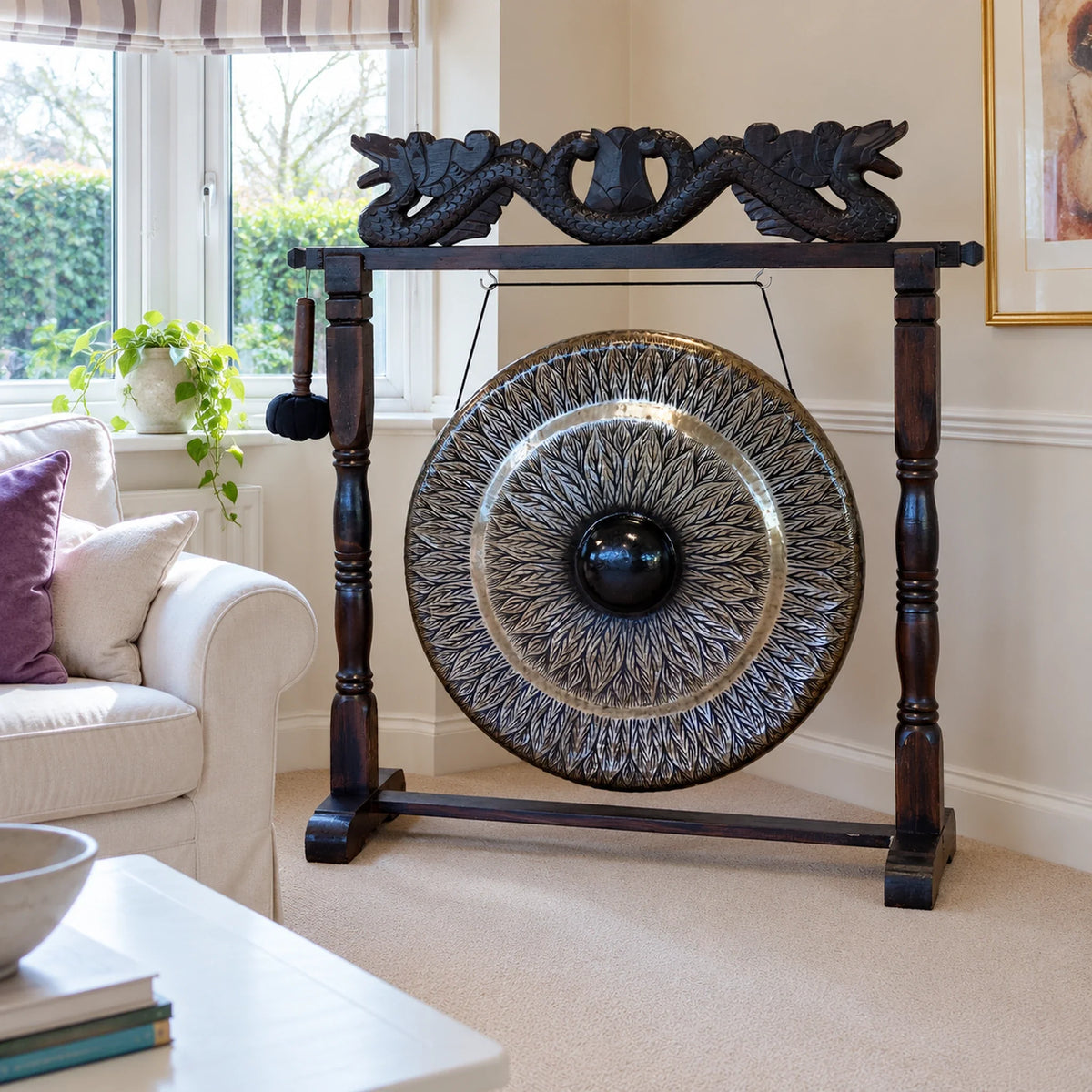 Large Healing Gong in Antique Dragon Stand, 80cm, Black Patterned beside a window in a British living room.