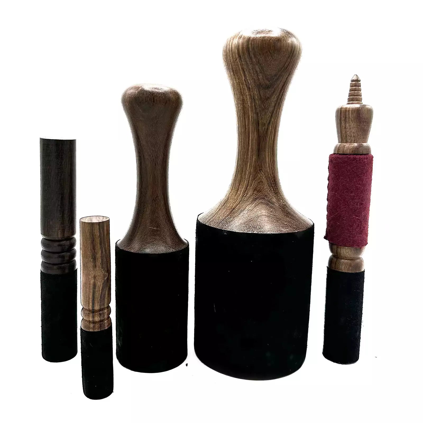 Set of wooden and black cylindrical objects on a white background