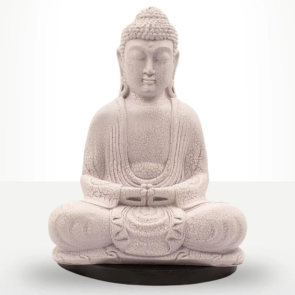 A seated Buddha statue in a light stone-like beige color with a textured, crackled finish, resting on a round black base against a white studio background.