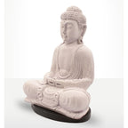 A seated Buddha statue in a light stone-like beige color, displayed on a dark oval base against a clean white background.