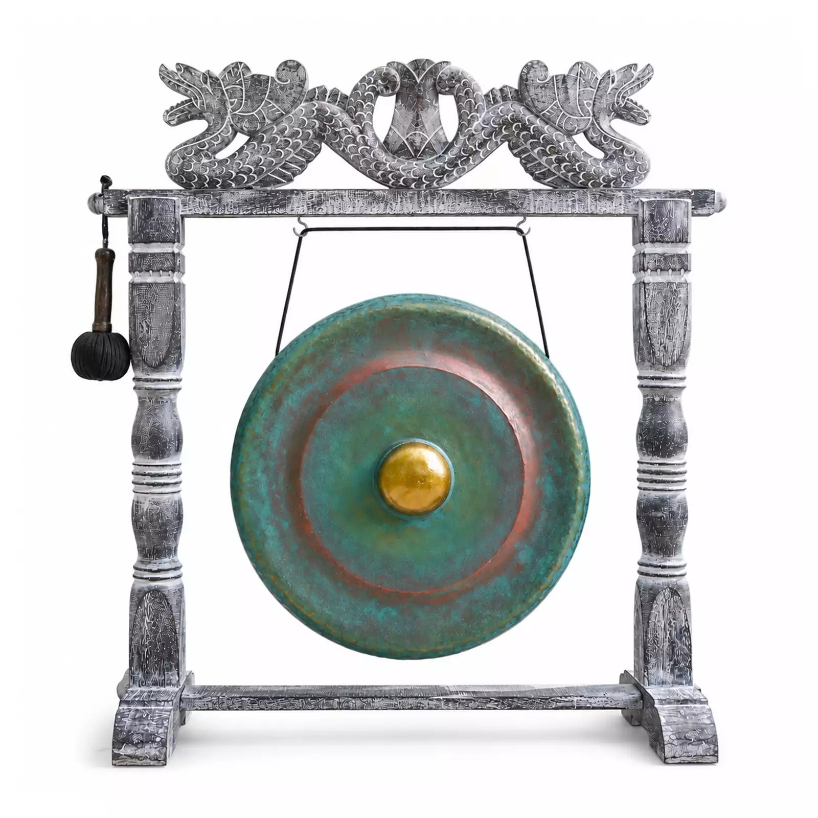 A decorative gong with a distressed gray wooden frame and a round green patinated metal drum head featuring a gold center, shown on a white background with a hanging mallet.