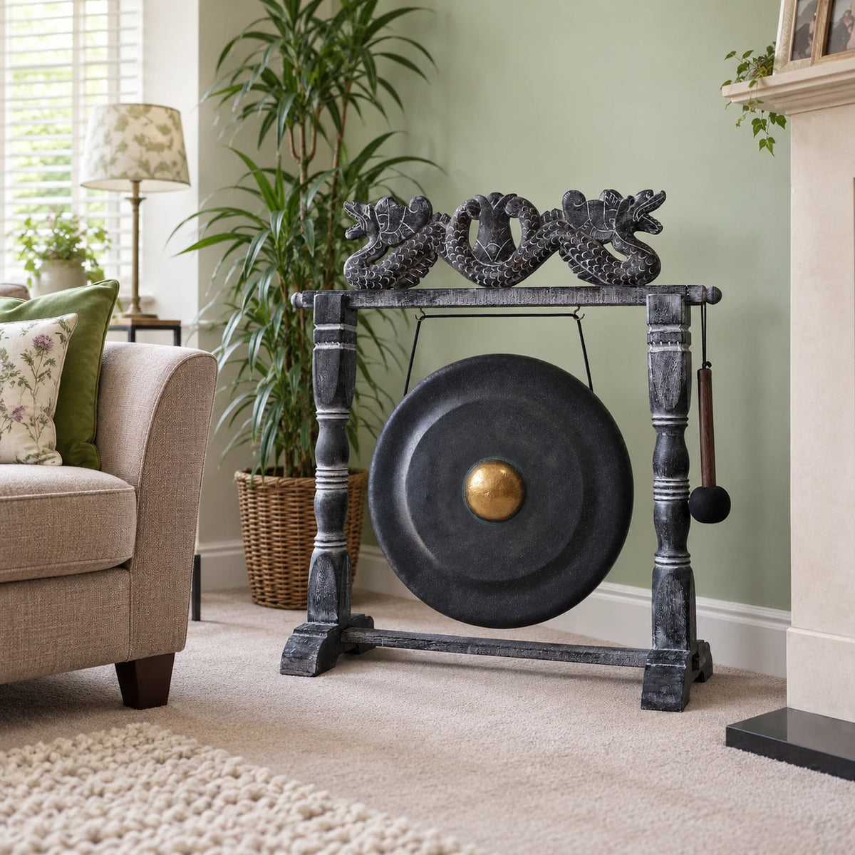 Medium Healing Gong in Wooden Stand, 50cm, Black in a British sitting room.
