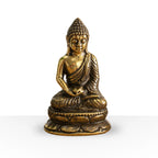 Mini Meditating Sitting Buddha statue in a detailed brass finish, depicting a serene Buddha seated in meditation on a lotus pedestal, perfect for tranquil home décor.