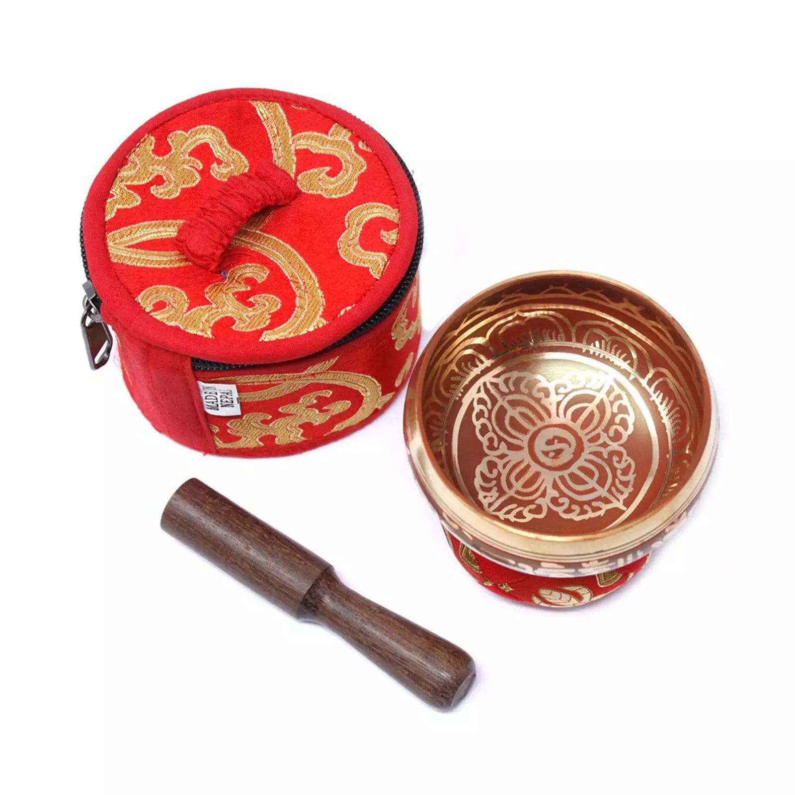 A Tibetan singing bowl set on a white background, including a red and gold embroidered zippered case, an open bronze-colored singing bowl with a floral relief, and a dark brown wooden mallet.