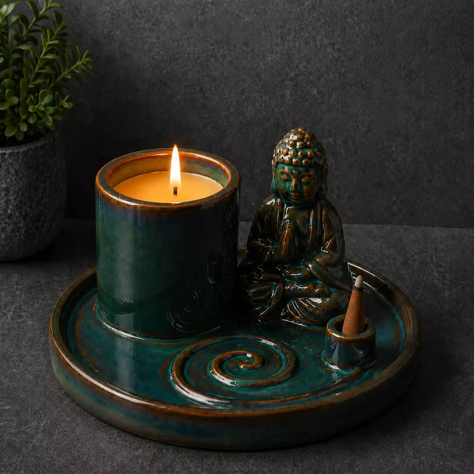 Multi Purpose Buddha Incense Plate - Ceramic Blue featuring a glossy ceramic blue finish, a Buddha figure, a lit candle holder, and a smoldering incense stick emitting smoke.