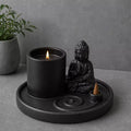 Multi Purpose Buddha Incense Plate - Ceramic Matt Black featuring a serene seated Buddha figure, round base with spiral design, and holders for incense sticks and cones.