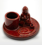 Multi Purpose Buddha Incense Plate - Ceramic Soft Red featuring a glossy red ceramic finish with a small Buddha figure, a holder for incense sticks, and a round base.