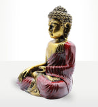 Red & Gold Buddha - Large sitting in a meditative pose with intricate hair curls, detailed facial features, and a flowing robe combining vibrant red and antique gold finishes, showcasing a handcrafted resin Buddha statue.