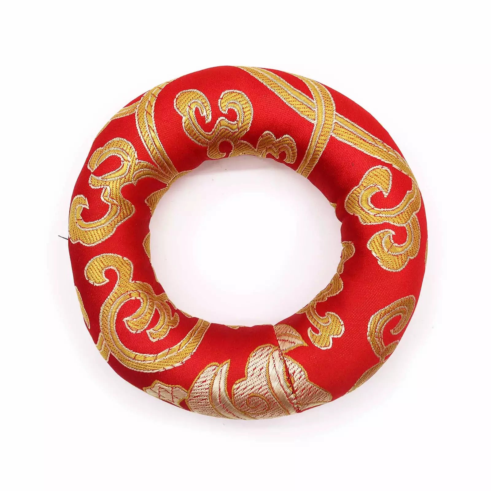 A red fabric ring cushion with ornate gold embroidered patterns, photographed on a clean white background.