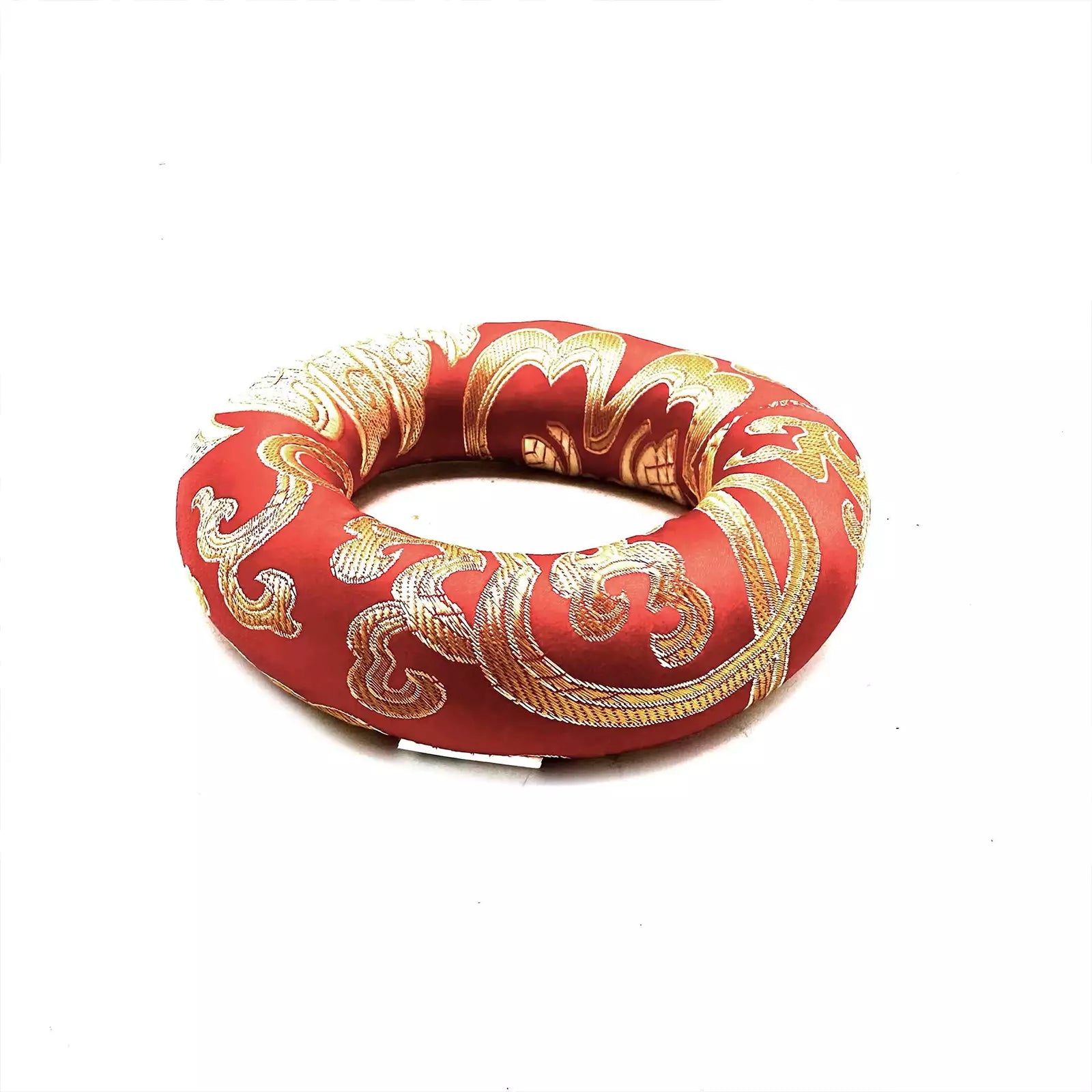 Red inflatable ring with gold patterns on a white background