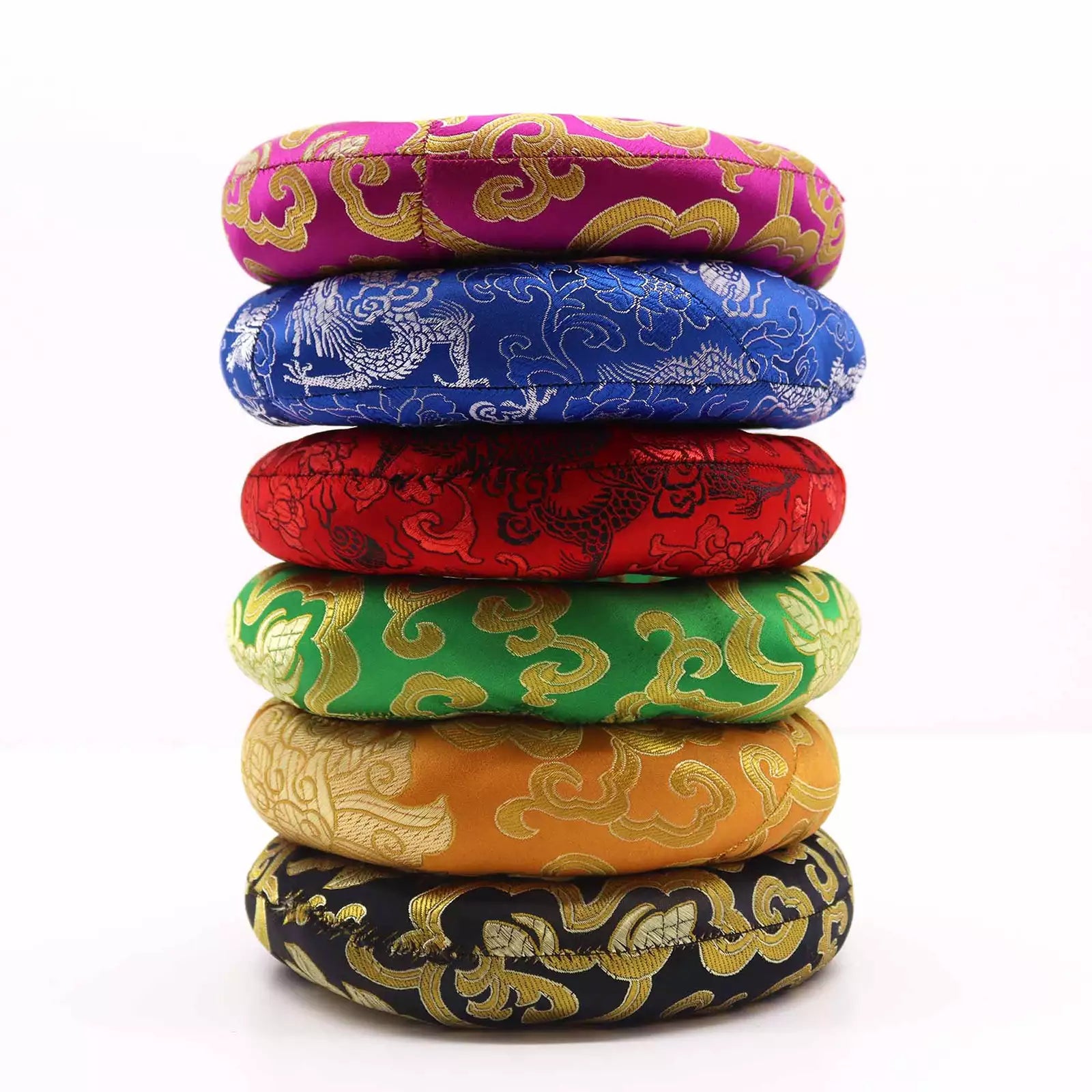 A stack of seven round woven cushions in vibrant colors, each featuring traditional Chinese dragon and cloud patterns in gold brocade fabric. The cushions are stacked vertically on a clean white background, showing a variety of base colors including magenta, blue, red, green, orange, and black.