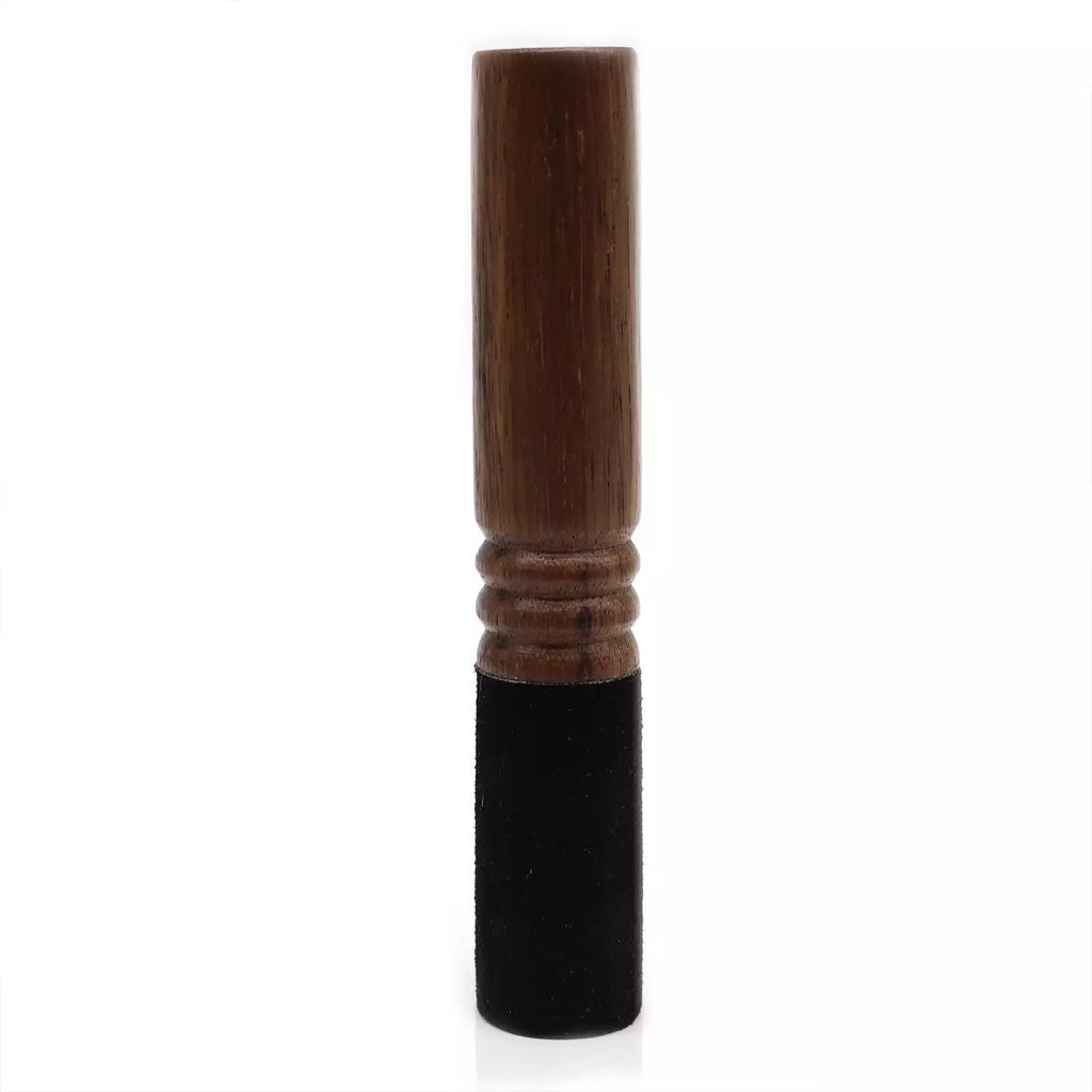 A wooden stick-like product with a dark brown wood-grain top section and a black textured lower section, shown upright on a plain white background.