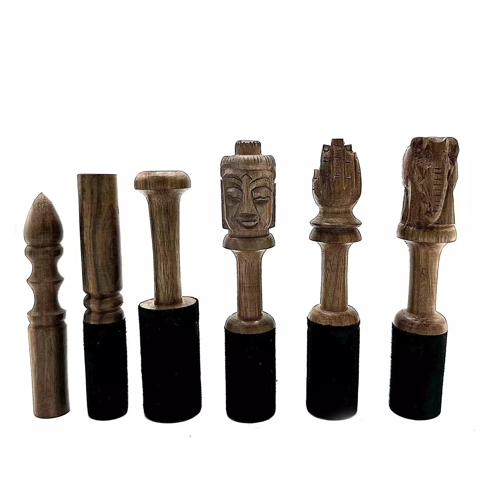 Set of wooden figurines with black bases on a white background